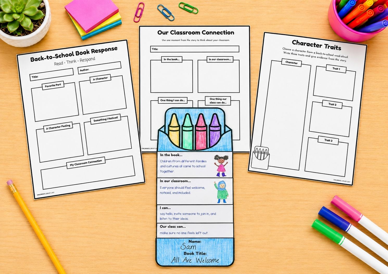 Mockup of three back-to-school book response worksheets and a foldable mini book on a classroom desk with school supplies.